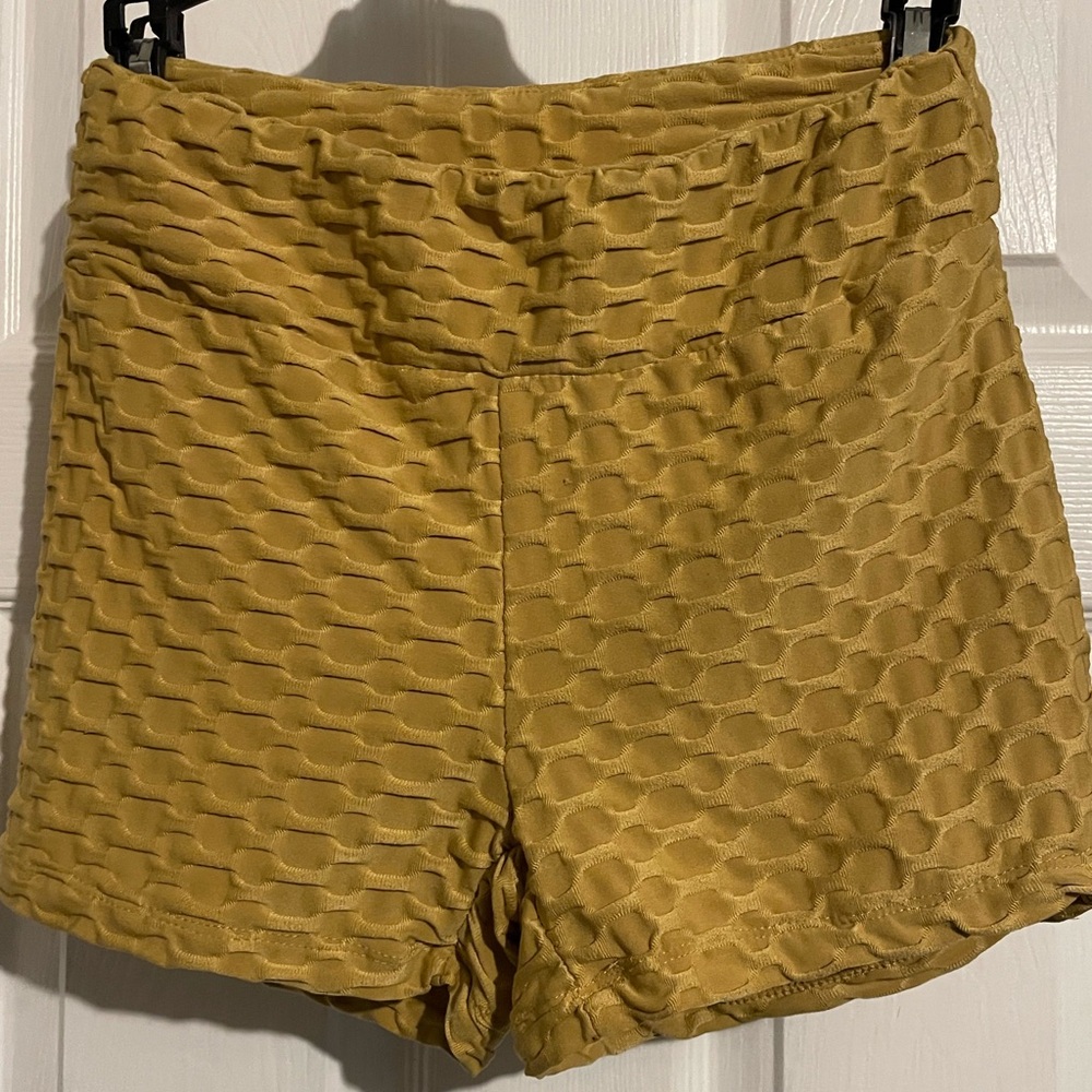 Eye Candy Textured Gold Women's Athletic Shorts. Pleated in the rear.